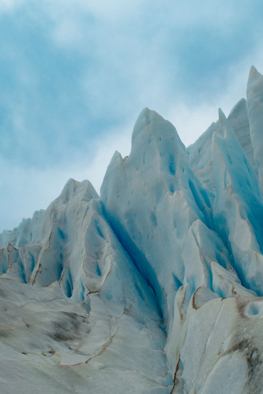 Majestic glacier reflecting into Patagonian lake