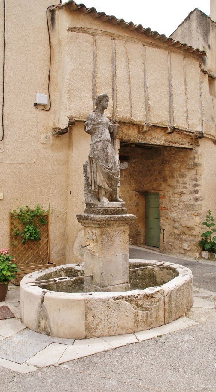 Provencal stone estate surrounded by hills and vineyards